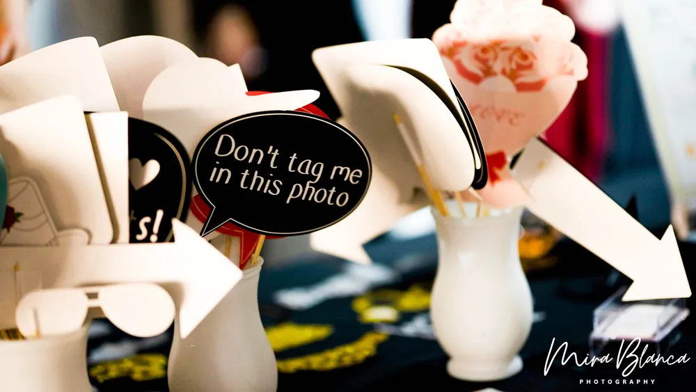 Playful Photo Booth props arranged for guests