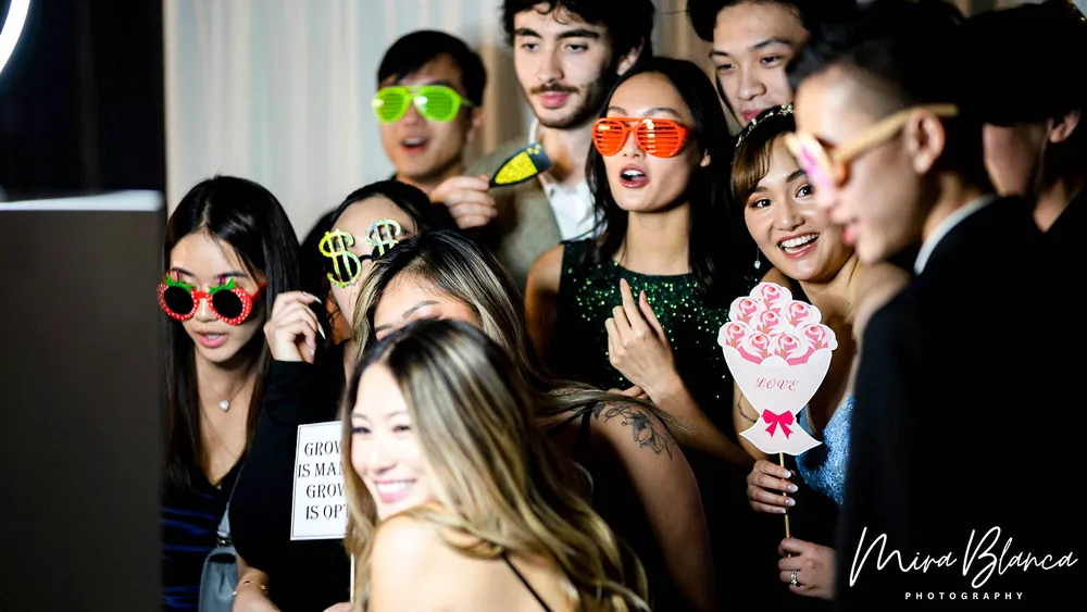 Group celebrating together at the Photo Booth